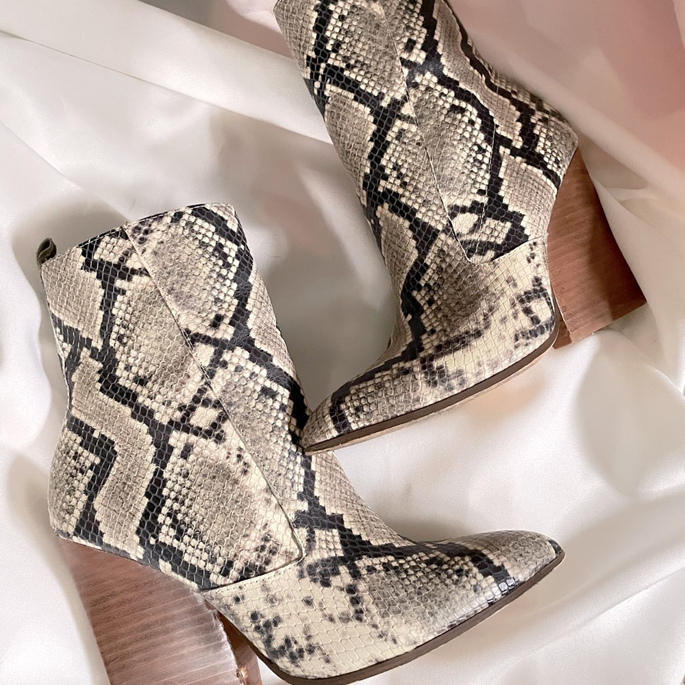 Snakeskin print leather boots